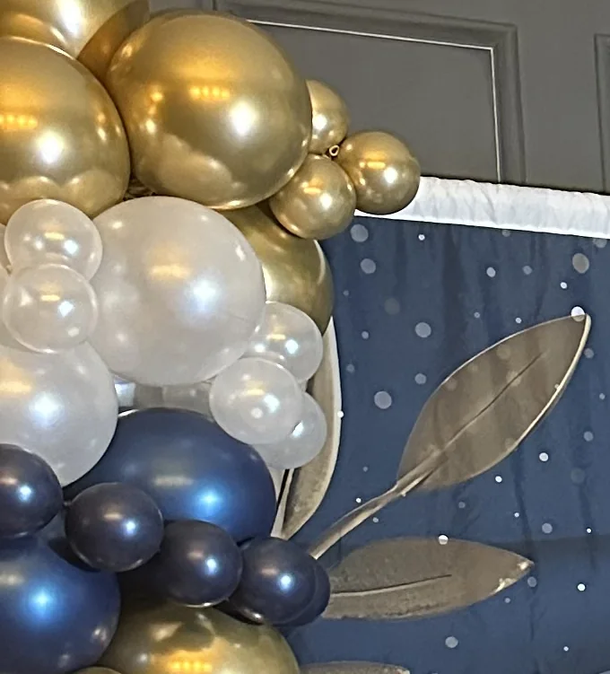 Gold and pearl balloon styling at one of our events.