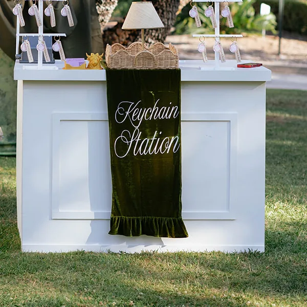 The Keychain Station bar set up on a lawn.